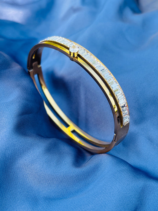 Baguette Solitaire Gold Bangle